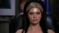 Shan'auc wendet sich an das Stargate-Center.